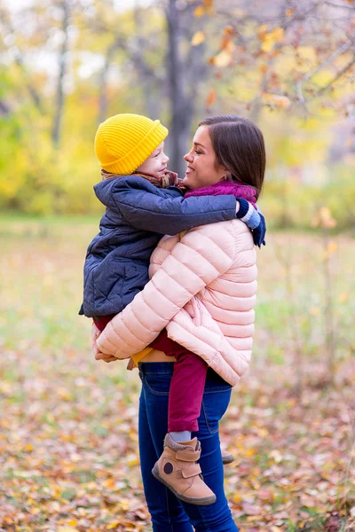 Mother With Young Son On hands Autumn Park — Stock Photo, Image