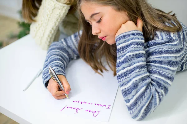 Two girls write a letter to Santa Claus — Stock Photo, Image