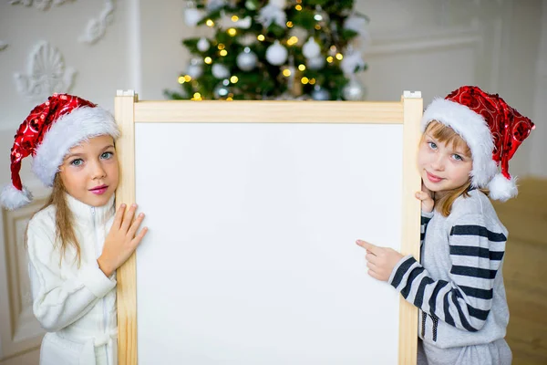 Girl with white board, Christmas — Stock Photo, Image