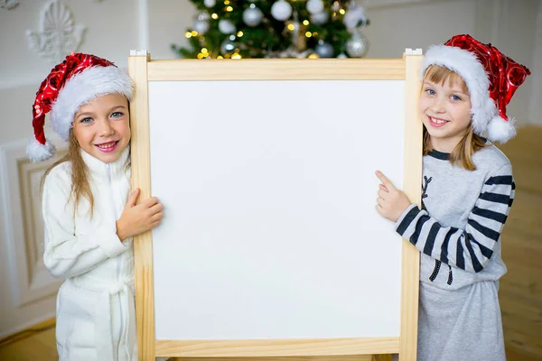 Girl with white board, Christmas — Stock Photo, Image