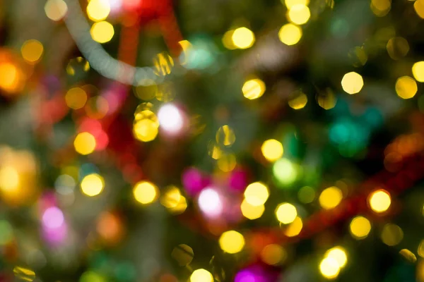 Bokeh Christmas interior decorated in many colors — Stock Photo, Image