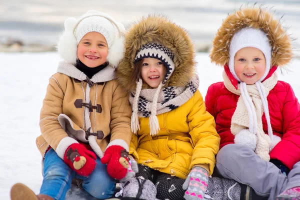 Group of young girls on the frozen lake — Stock Photo, Image