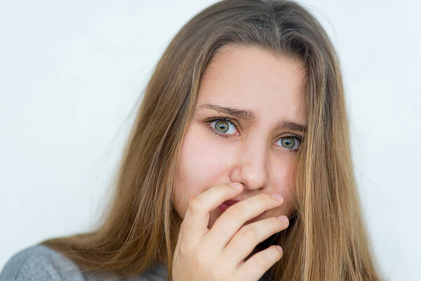 Teenager girl emotional posing isolated