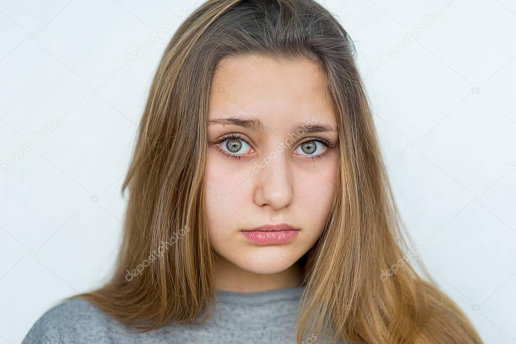 Teenager girl emotional posing isolated