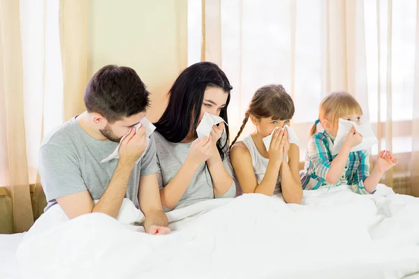 the family is sick in bed