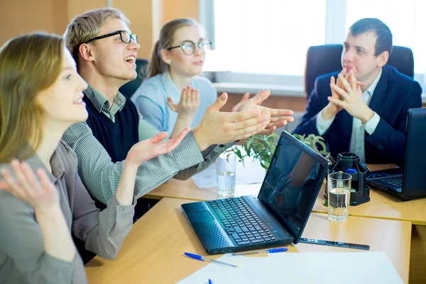 stock image discussion of workers at the desk business ideas