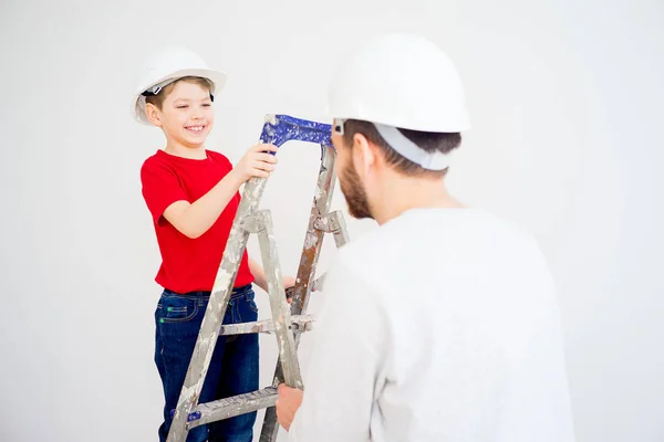 Father and son working together