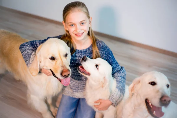 Girl with her dogs — Stock Photo, Image