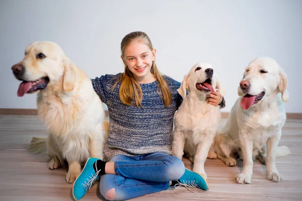 Girl with her dogs — Stock Photo, Image