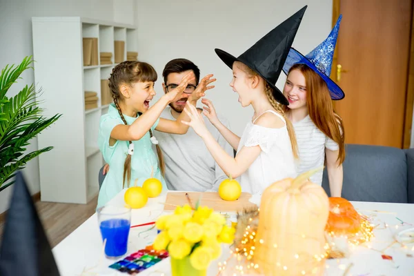 Family celebrating halloween