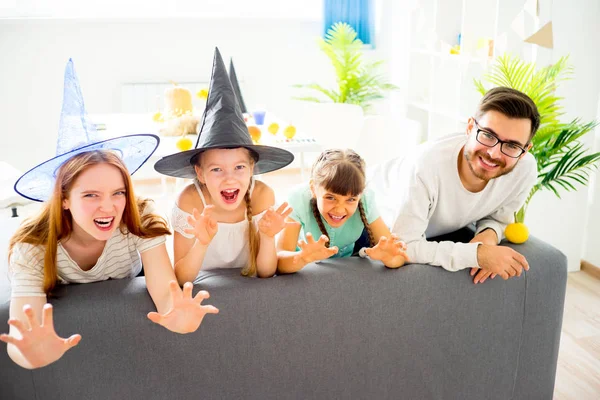 Family celebrating halloween