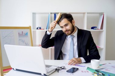 Sakalını penye işadamı