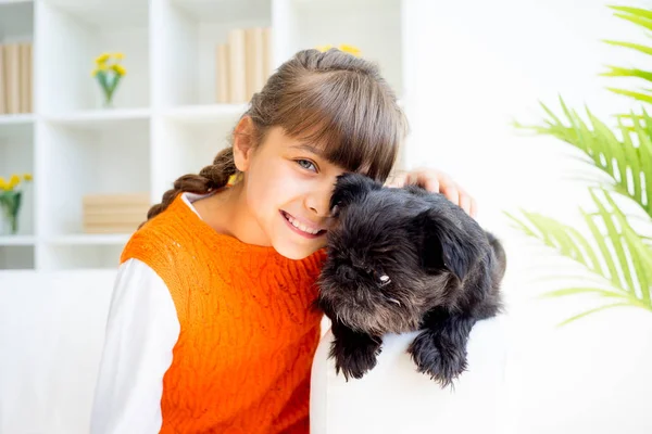 Grandaughter with a dog — Stock Photo, Image