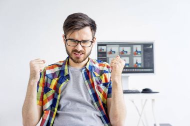 Retoucher editing photos