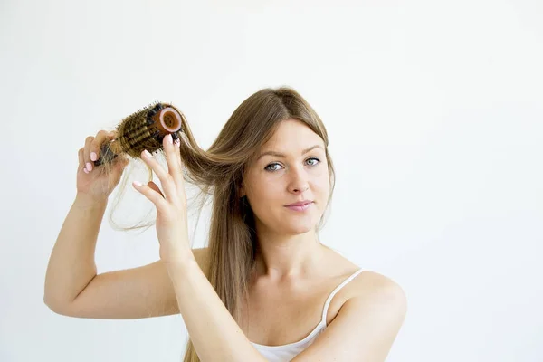 Dívka, péče o vlasy — Stock fotografie