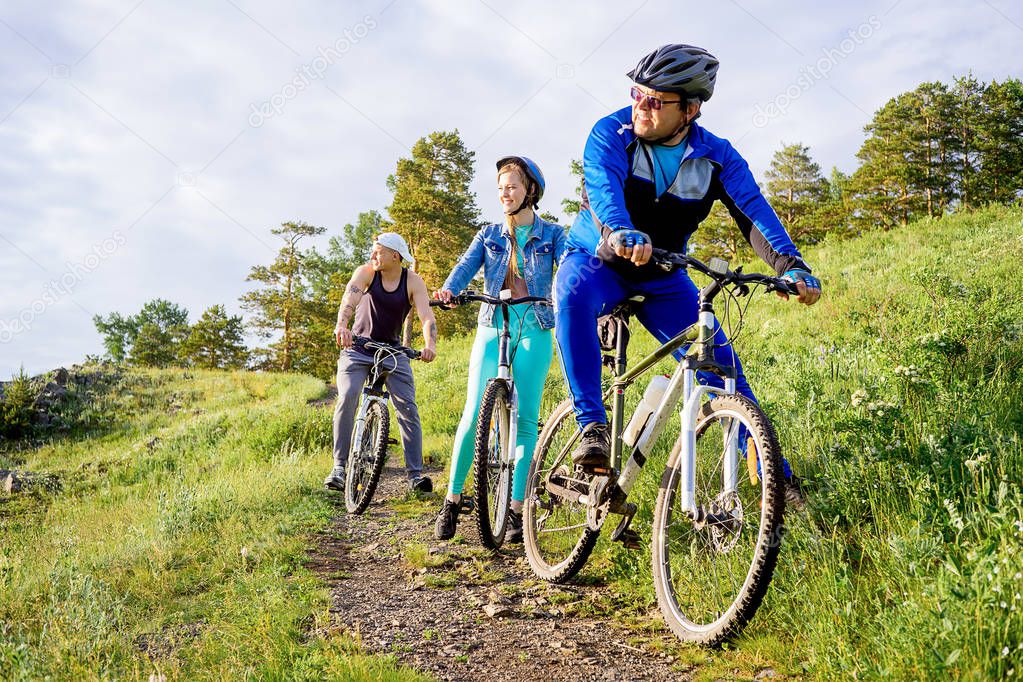 People travelling on a bicycle