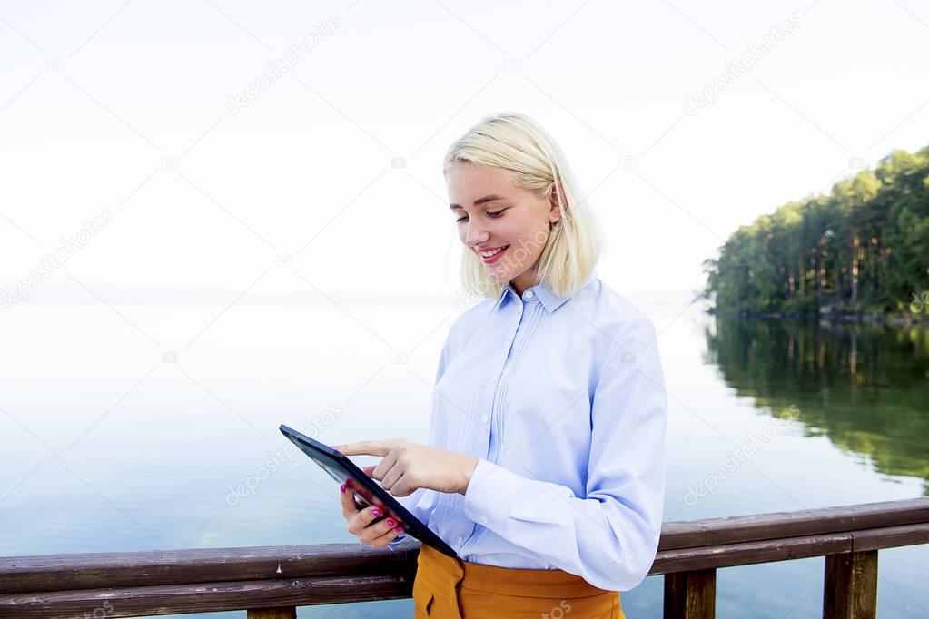 Businesswoman working on a beach