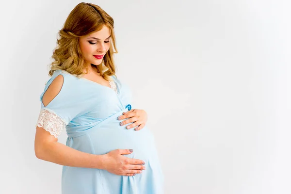 Uma mulher grávida — Fotografia de Stock