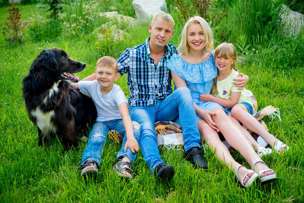 Family picnic with a dog