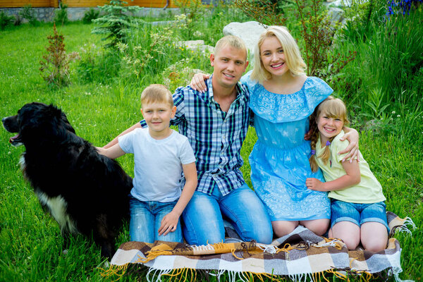 Family picnic with a dog