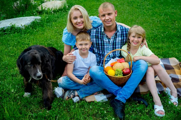 Family picnic with a dog