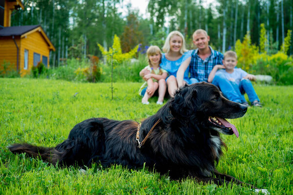 Family picnic with a dog