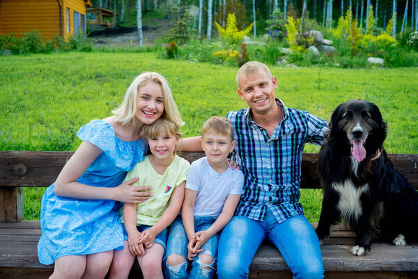 Family picnic with a dog