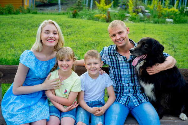 Family picnic with a dog