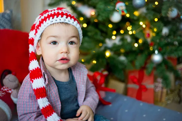 Baby in a christmas hat — Stock Photo, Image