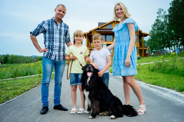 Family picnic with a dog — Stock Photo, Image