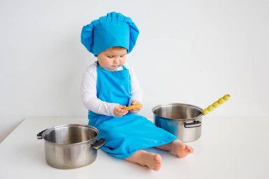 Baby in chef hat