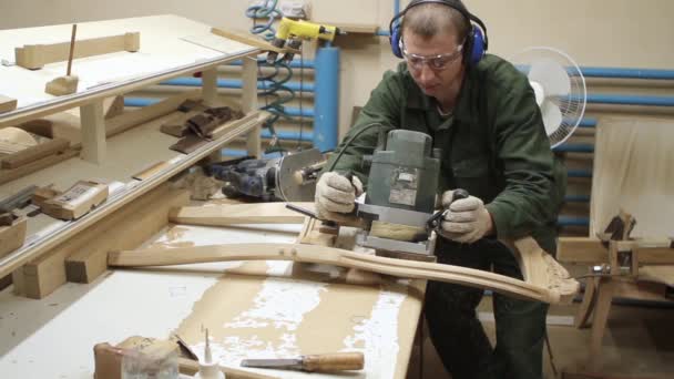 Manual processing of wood with tools at the woodworking and furniture plant — Stock Video