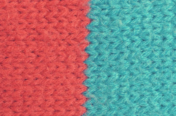 Textile texture of wool of red and blue colors.
