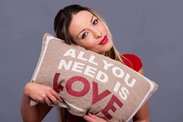 Valentines Day message with pillow all you need is love — Stock Photo, Image