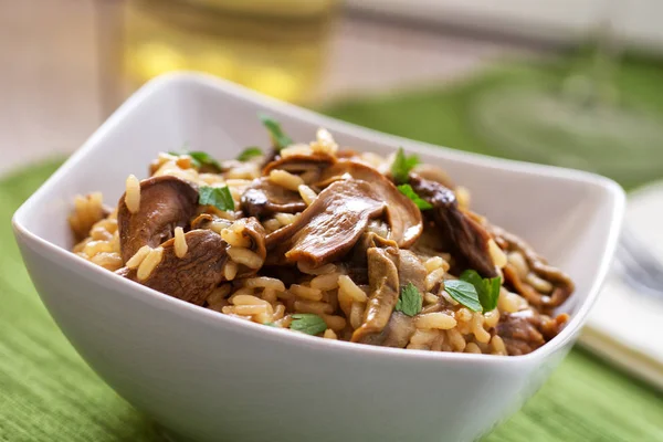 Wild mushrooms risotto with parsley and parmesan — Stock Photo, Image