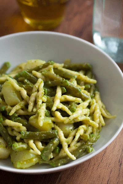 Pasta with pesto sauce — Stock Photo, Image