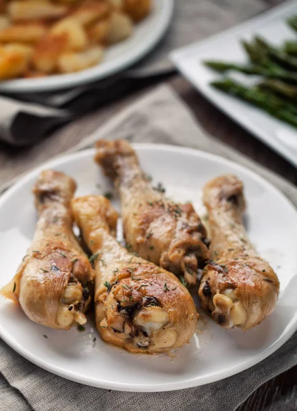 Roast chicken with potatoes and asparagus