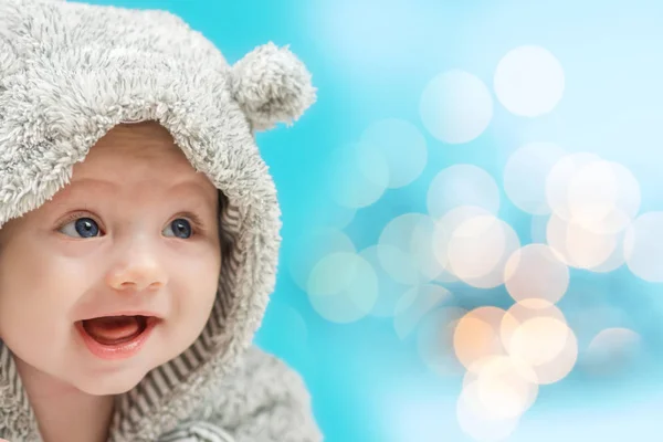 Happy baby in bear like suit — Stock Photo, Image