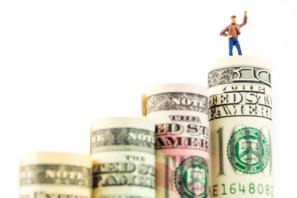 Miniature figurine with victory gesture on most valued american dollar — Stock Photo, Image