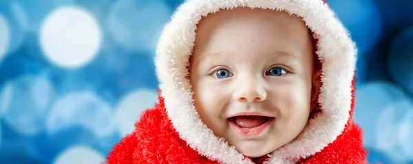 Smiling baby boy in Santa Claus dress — Stock Photo, Image