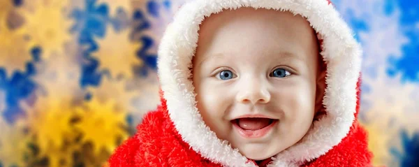 Niño sonriente en vestido de Santa Claus —  Fotos de Stock