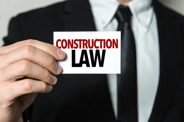 Card with sign construction law — Stock Photo, Image