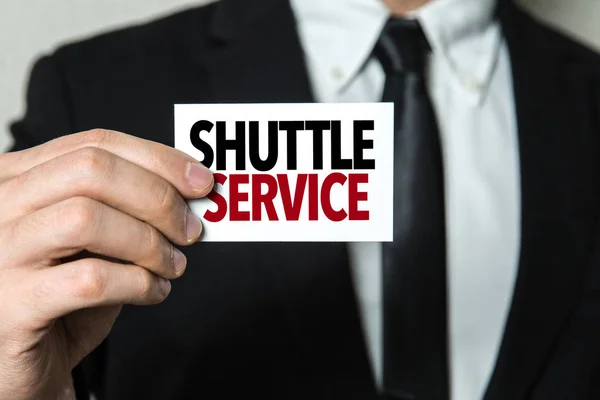 Card with sign shuttle service — Stock Photo, Image