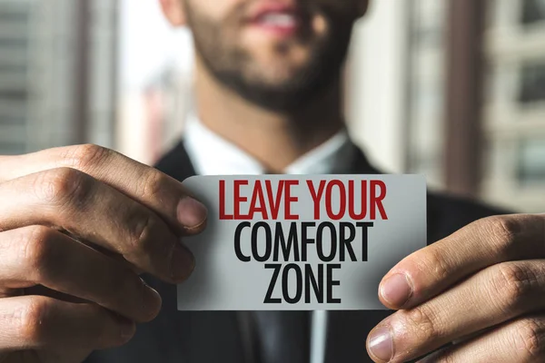 Businessman holding paper with sign — Stock Photo, Image