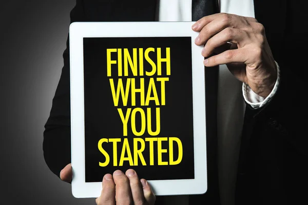 Надпись Finish What You Started — стоковое фото