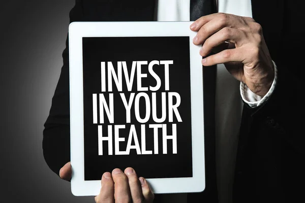 Inscrição investir em sua saúde — Fotografia de Stock