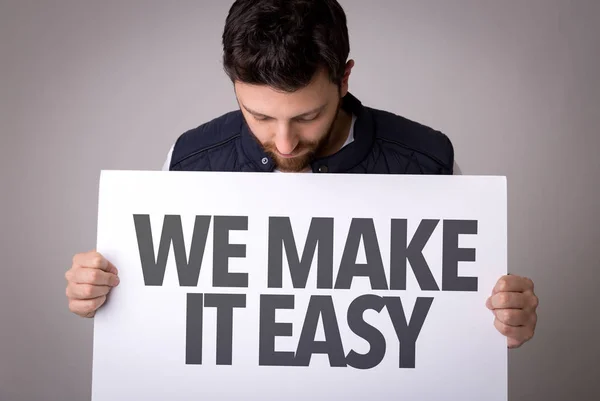 Paper with sign we make it easy — Stock Photo, Image