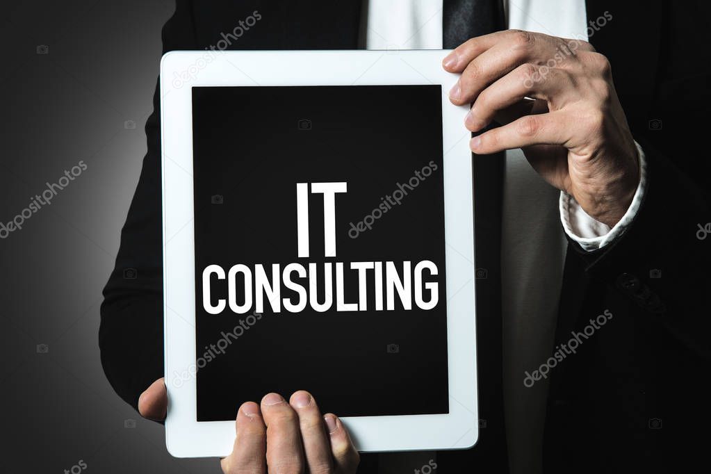 tablet with inscription IT Consulting