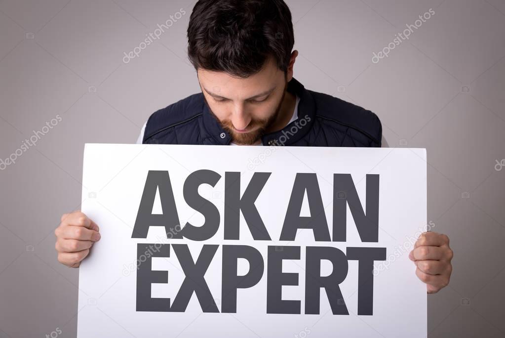 paper with sign Ask An Expert