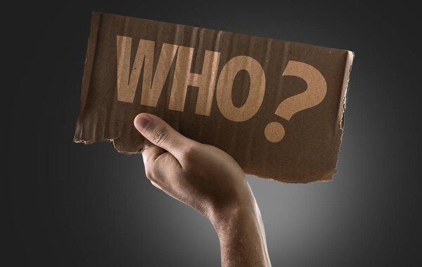 cardboard with sign Who?